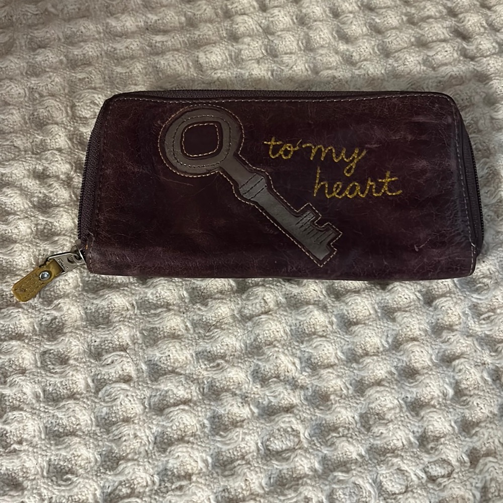 Preowned Fossil purple leather wallet